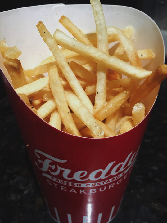 Fresh+out+of+the+box%2C+sits+Freddy%E2%80%99s+fresh+cut+fries.+%E2%80%9CThe+seasoning+tastes+like+no+other+fry%2C%E2%80%9D+Sophomore%2C+Michael+Chestnut+said.%E2%80%9D+Photo+by%3A+Jordan+Argano+