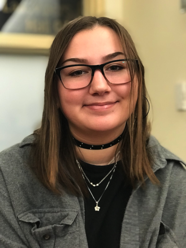 Kelly+Hickey+in+her++Psychology+class+right+after+taking+notes.+She+took+over+3+pages+of+notes+during+this+period+and+tried+to+make+them+as+neat+as+she+can+so+she+can+learn+better.+Photo+Credit+to+Jessica+Quintana.