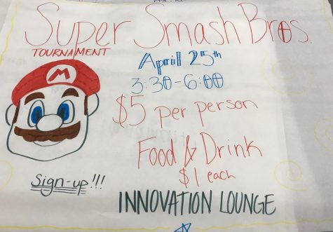 A student made poster advertises the upcoming Super Smash Bros. Tournament. The tournament was planned by the National Honor Society as a fundraiser. The poster was made by NHS President Naomi Kharrl and Krysyan Edler.
