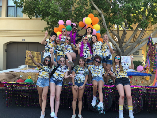 The JV Verrado volleyball team together on their float after the annual Homecoming parade. 
Pictured- (starting at top left) Skye Pippin, Sydney Harding, Ashley Solis, 
Arlette Acosta, Lauren Thibodeaux, Taylor Hull, Emily Wilson, Serena Navarro, Alyssa Cluff,
Izzy Monzone, Emma VanValkenburg, Carolyna Montez, Raina Robinson, Kylee Oakley
