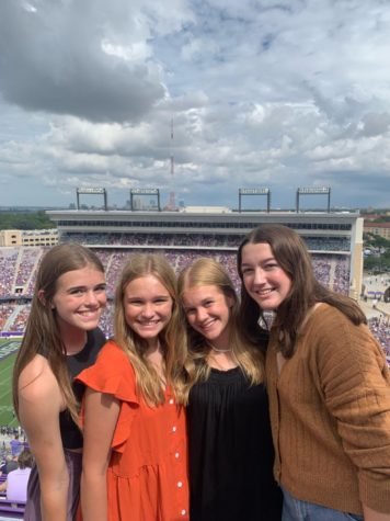 Gabby and friends at a football game in Amon G. Carter Stadium at TCU in Fort Worth, TX. 