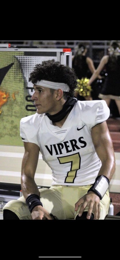 Viper QB Erick Santiago waits on the sidelines for the Defense to do their thing. 