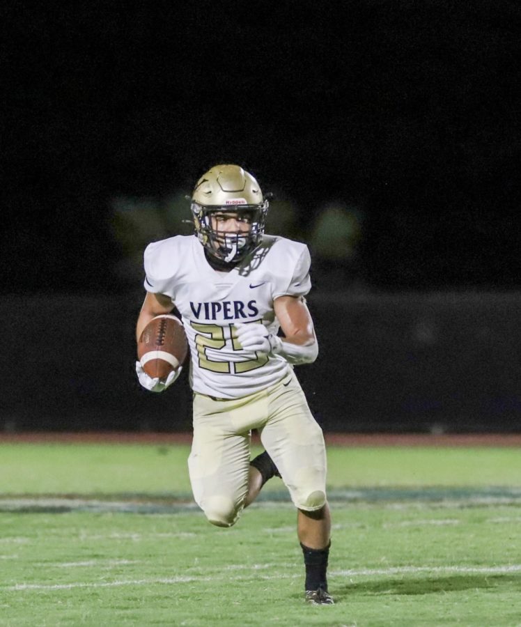Running back, Julian Virgen streaks down the sidelines during a Viper game. 