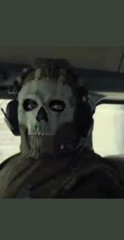 A character from Warzone 2.0 glares menacingly from the car. 