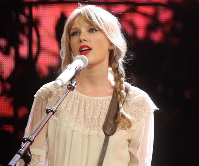 Taylor+Swift+in+an+ethereal+white+blouse+with+braids+is+the+perfect+look+for+her+Folklore+LP.