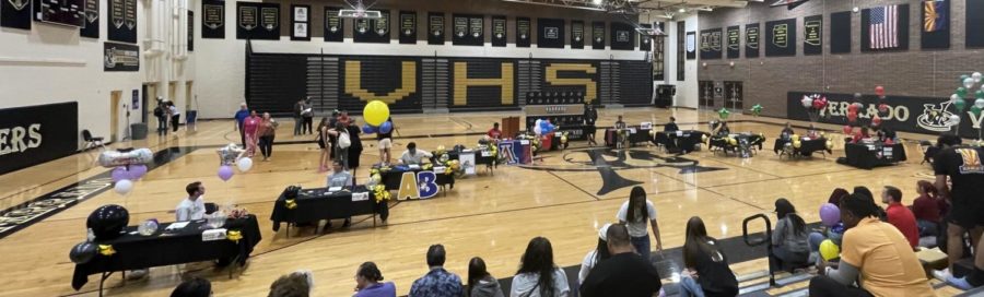 Students preparing to sign their letters of intent during the ceremony at Verrado High School.