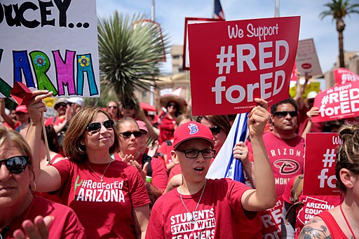 Red for Ed supporters at a protest hosted by the Arizona Education Association at the Arizona State Capitol complex in Phoenix, Arizona.