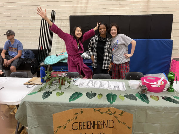 Members of the Greenhand Club gathering new people during club rush