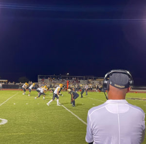 Head Coach Dustin Johnson observes as his defense takes on Barry Goldwater