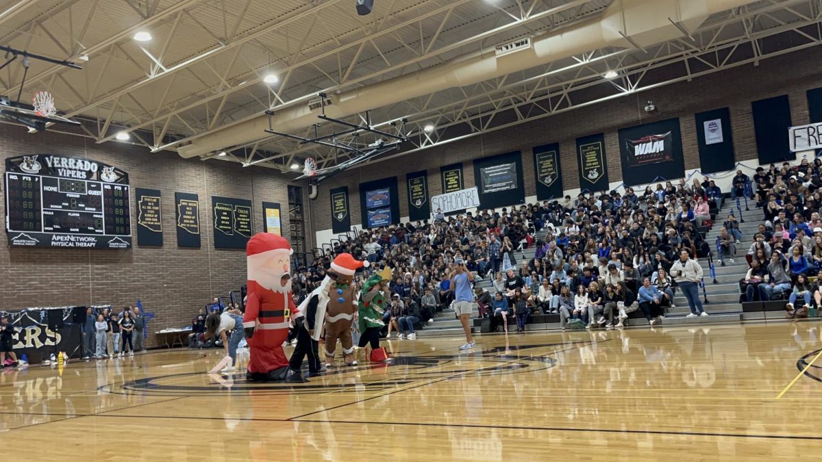 A race between Santa, a Snowman, a Gingerbread cookie and a Christmas tree during the Winter Assembly. 