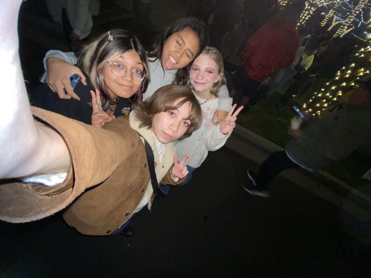 The journalism group hanging out during the Christmas lighting and they had fun!