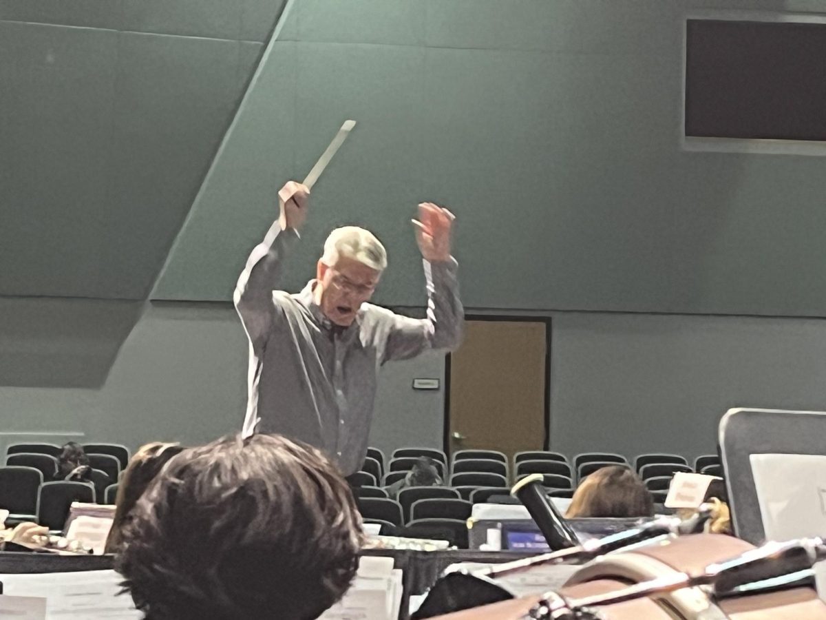 Eric Haenfler conducting the Agua Fria Distract honor in the song Incantations. 