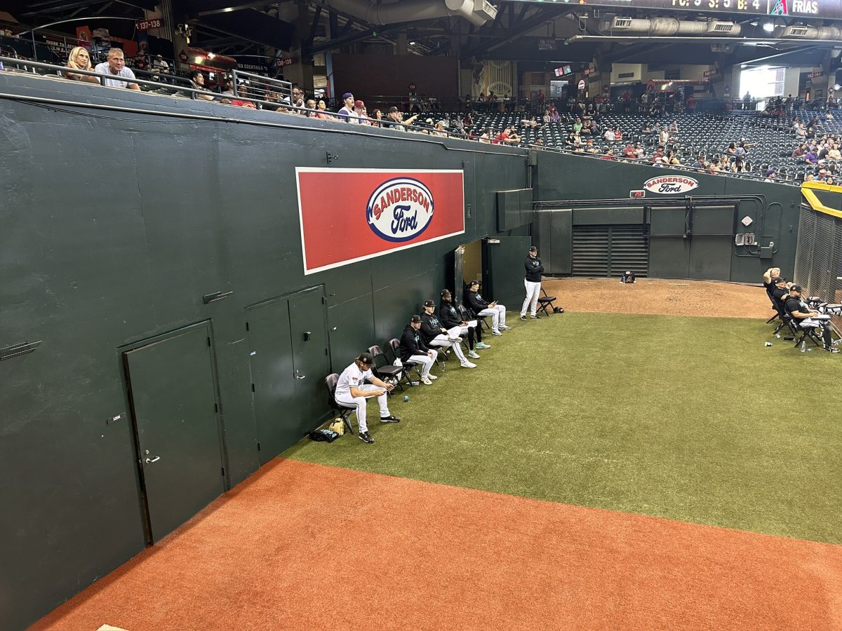 The Dbacks bullpen sits and waits for the manager, Torey Lovullo to make a call on who he wants to start warming up.