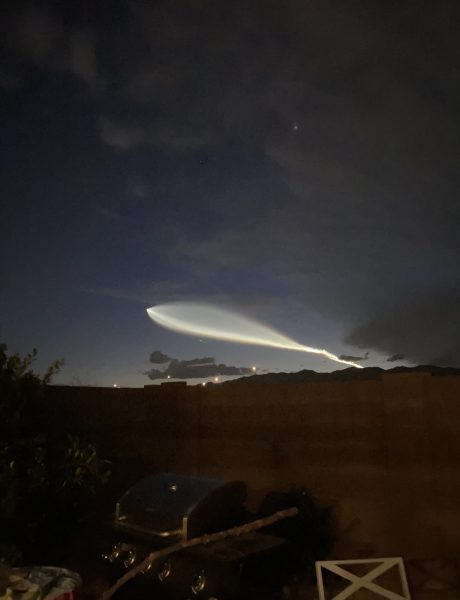 SpaceX Rocket leaves a beam of glowing smoke behind it as it goes slowly through the sky making people question what it is.