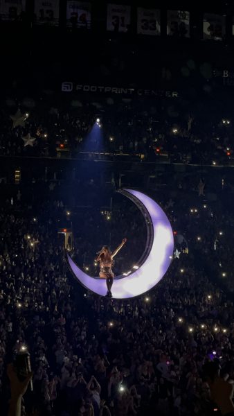Olivia Rodrigo on a floating moon singing Logical at the GUTS World Tour.