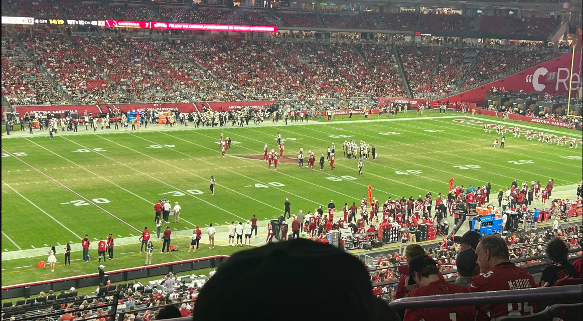 The Cardinals offense lines up for a play against the Saints' defense