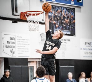 Brayden Barrett elevates over the Canyon View player picking up an easy score. Photo courtesy of Nickolas Ramirez.