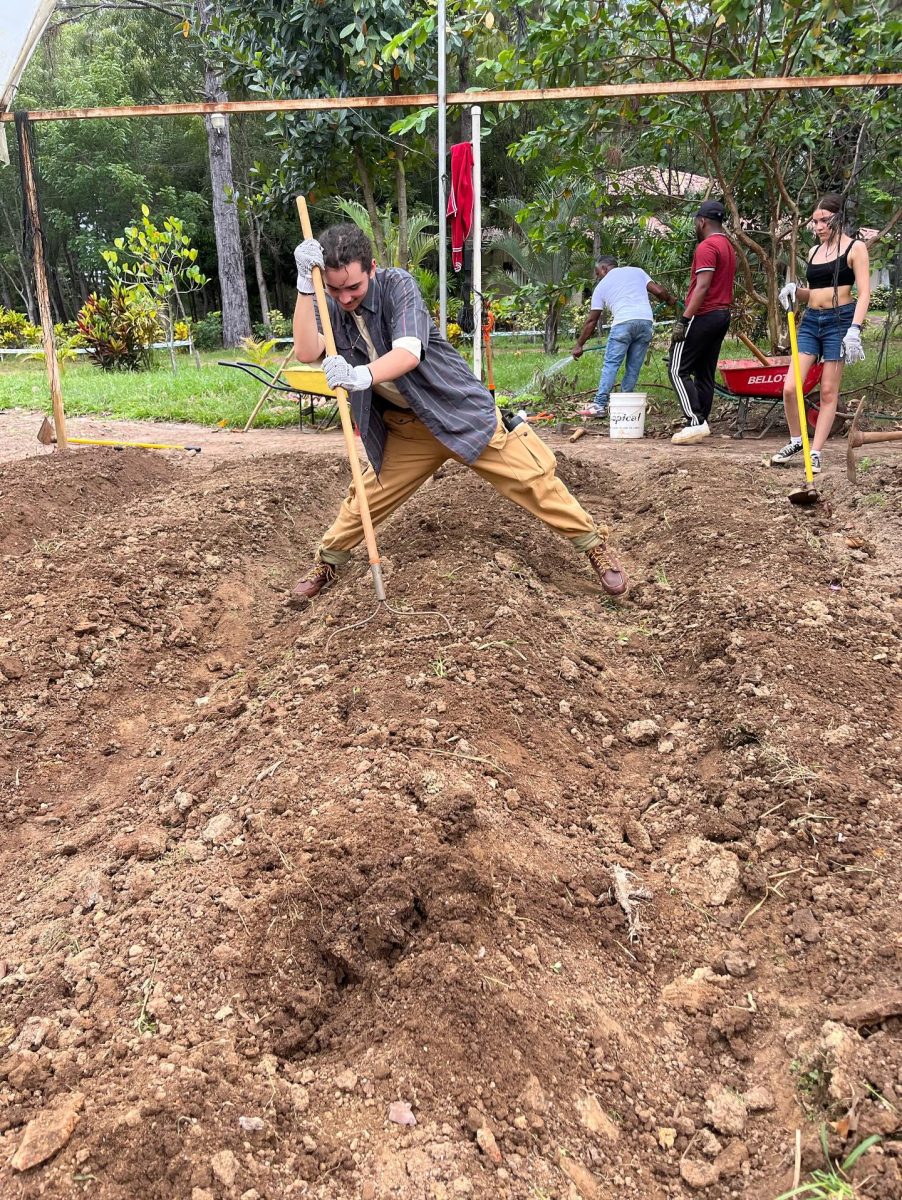 During an EF STEM Tour, Verrado student, Jaden Barrero helps till soil in the Dominican Republic for a local environmental college.