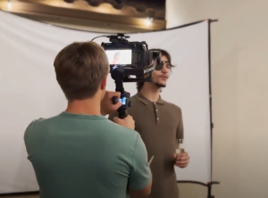 Nathan Fugitt films directs and films a scene for his student led film about a failed director. 
