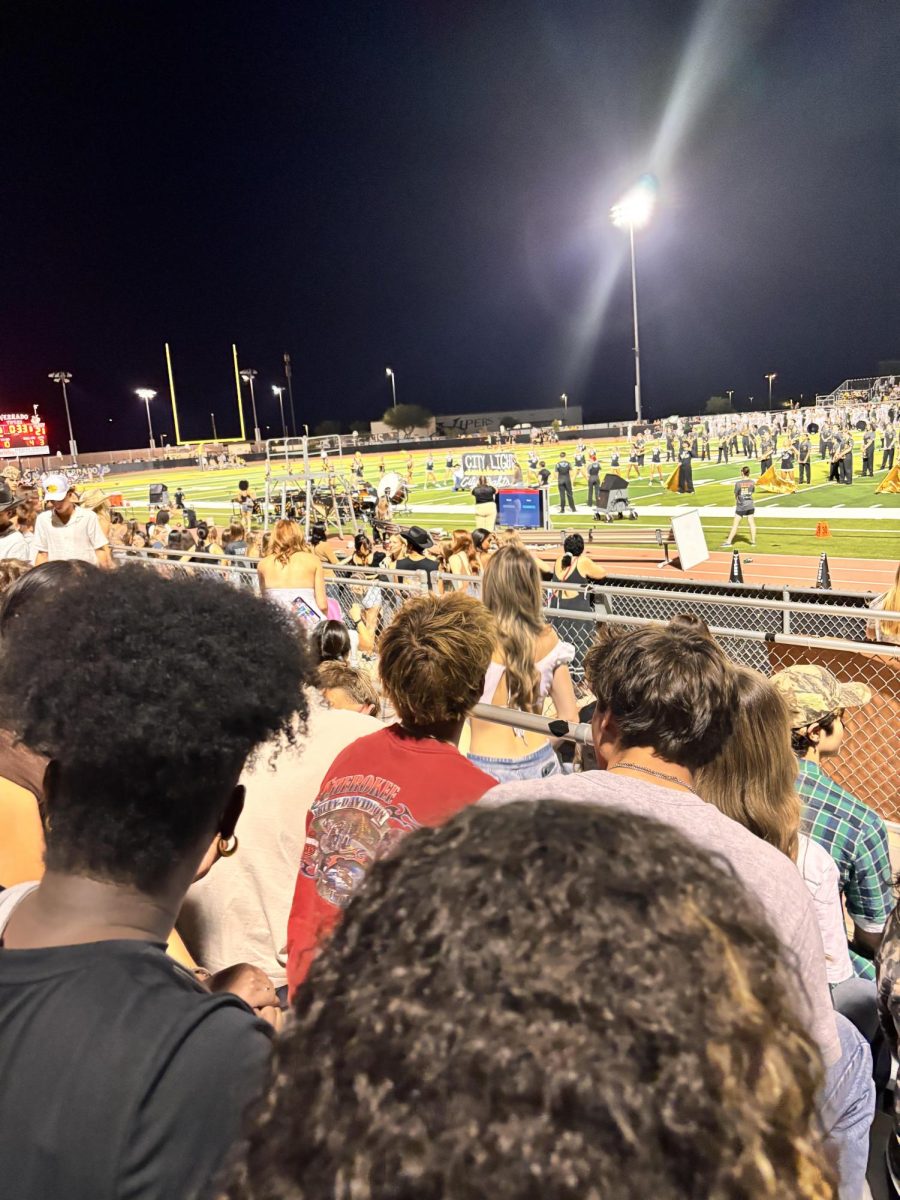 Friday Night Lights set the stage for Verrado's Homecoming announcement at the first varsity football game. 