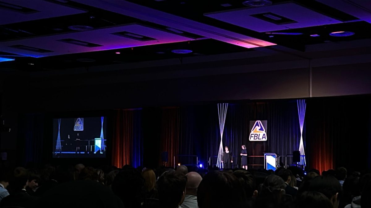 A photo of the start of the FBLA Conference with speakers from the FBLA Office.