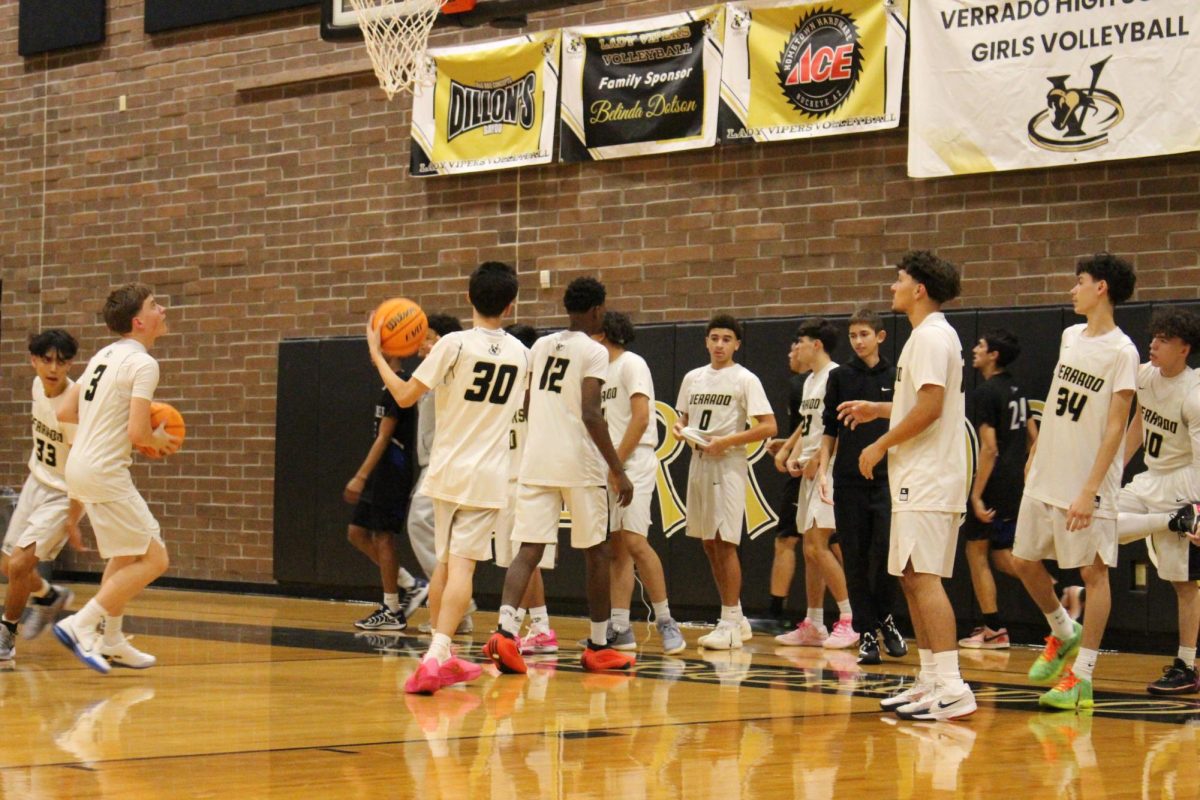 JV Boys warming up before their game against Chandler. 