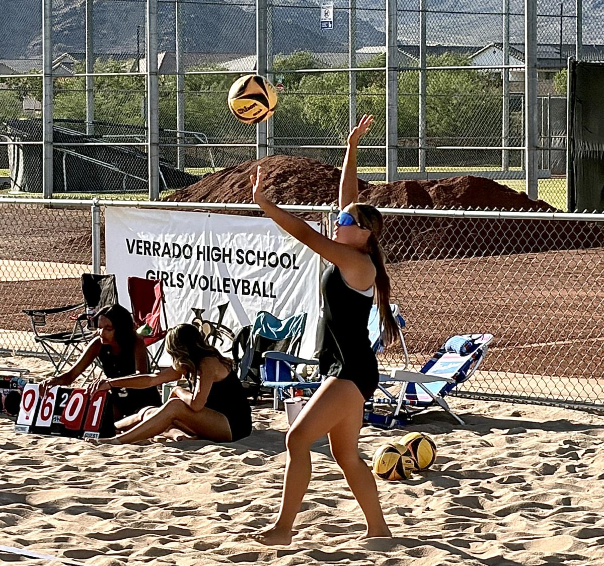 Elleanna Bejarano serves the ball over to the opposing team and earns an ace for her team.